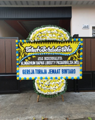 Papan Bunga Duka di Makmur